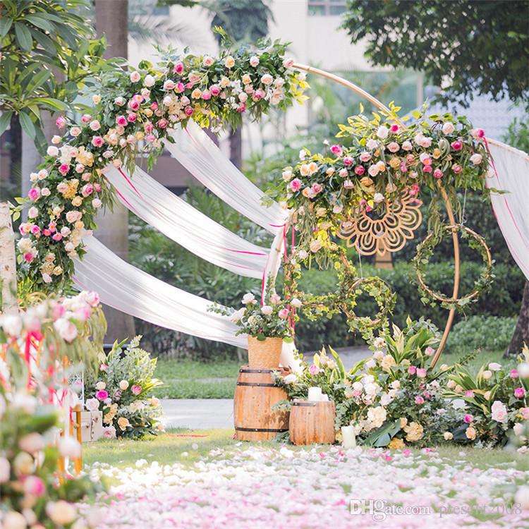 Sweetheart table round arch with flowers