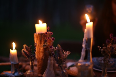 Burning candles outdoor/backyard wedding